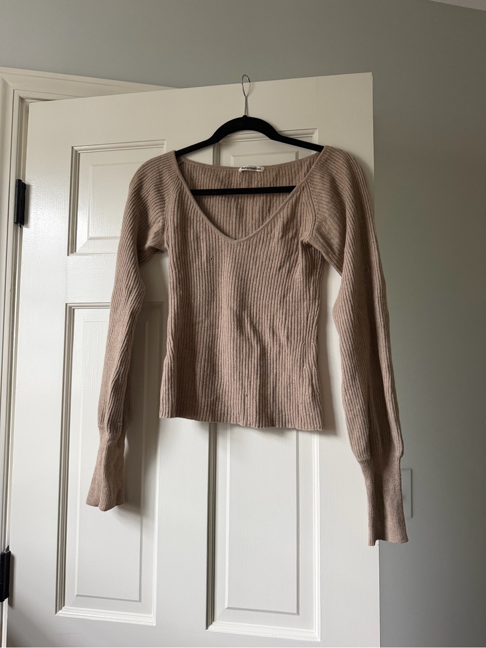 Reformation Ribbed V‑Neck Sweater in Light Beige